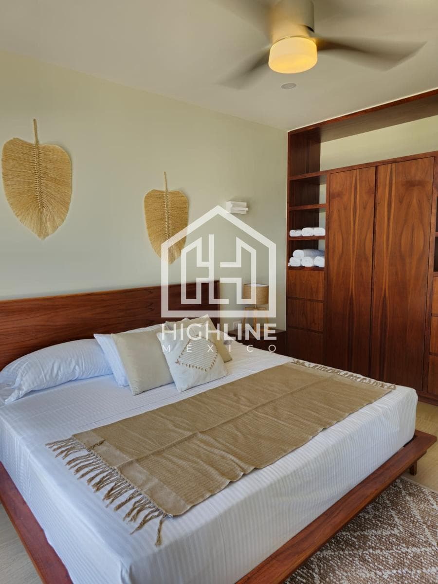 1-bedroom apartment with spacious rooms and a rooftop ocean view