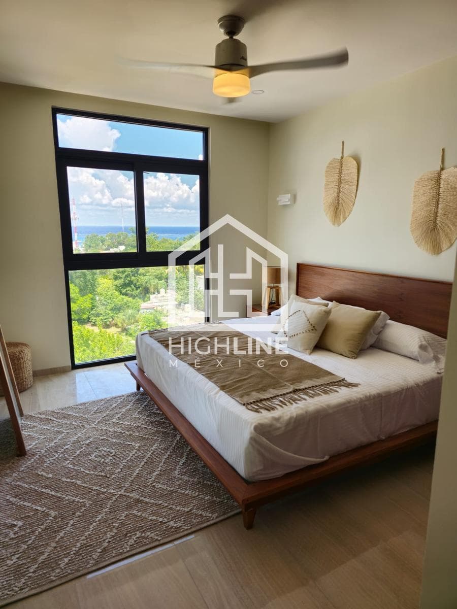 1-bedroom apartment with spacious rooms and a rooftop ocean view