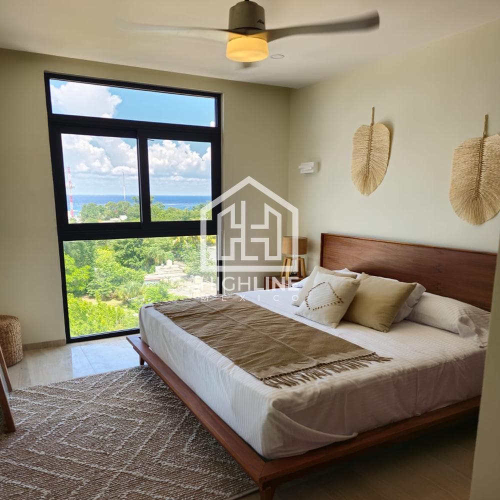 1-bedroom apartment with spacious rooms and a rooftop ocean view