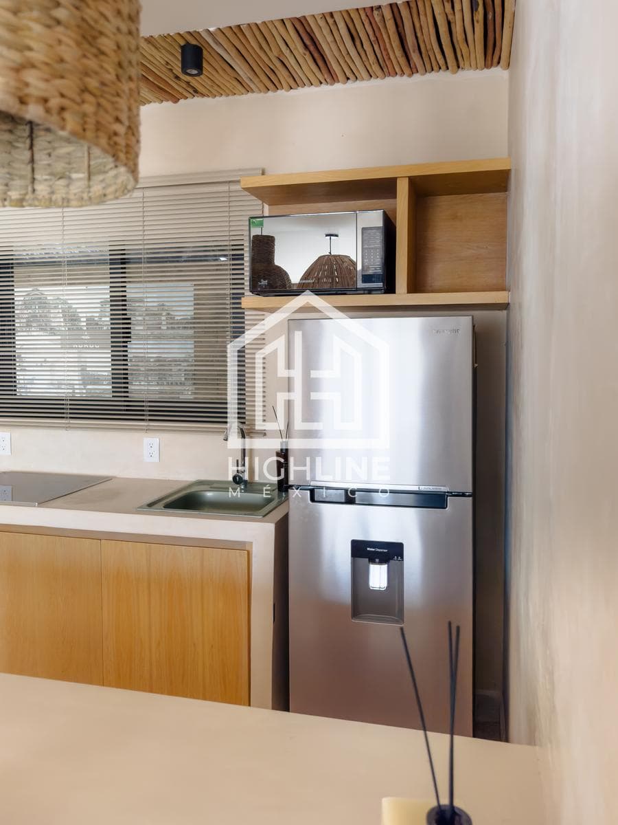 2-BEDROOM APARTMENT JUST MINUTES FROM THE BEACH / TULUM / 15% DOWN PAYMENT / GUARANTEED RENTAL INCOME.