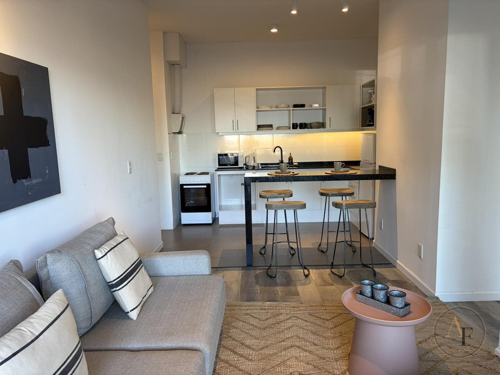 Ground-floor apartment with two parking spaces and a garden