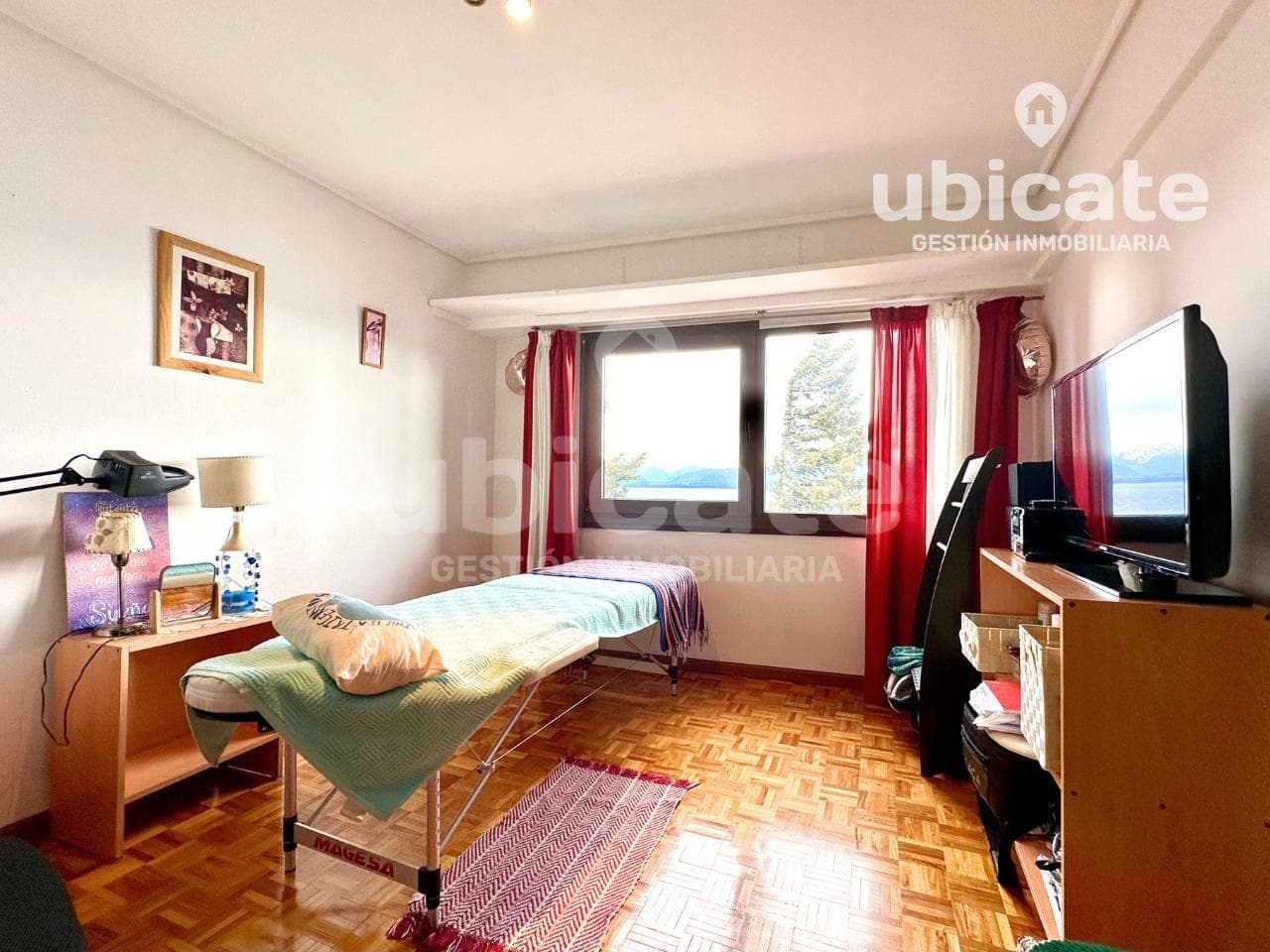 SPACIOUS APARTMENT WITH A VIEW OF LAKE NAHUEL HUAPI, ACROSS FROM THE CATHEDRAL