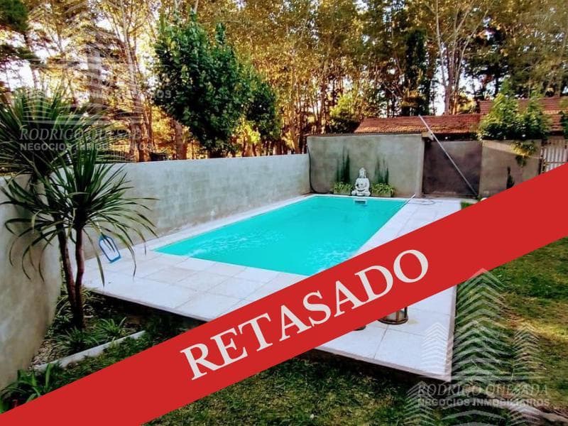 Excellent home with an ozone-heated pool. Set on a lush lot. A GREAT OPPORTUNITY—SET BACK FROM THE STREET
