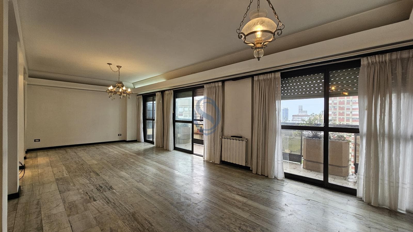 For Sale - Seven-room triplex apartment with a terrace and garage - Downtown