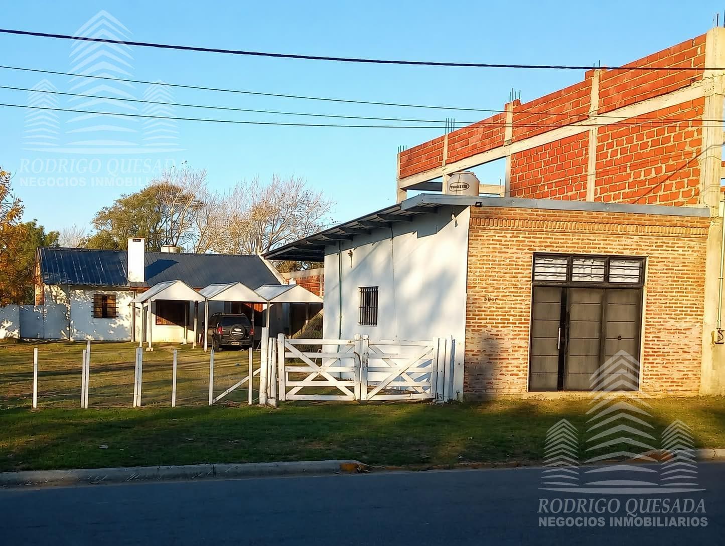 House, storefront, and apartment on Main Avenue!