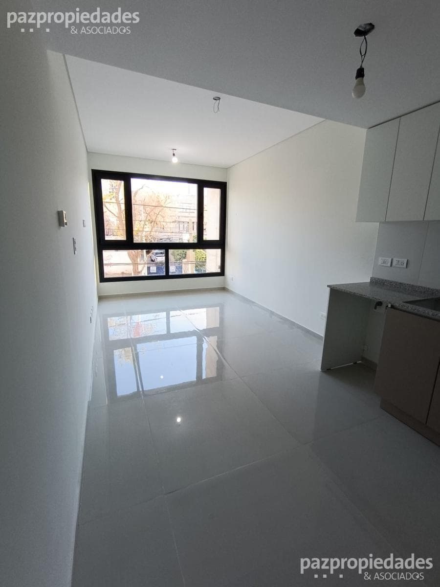 Spacious studio apartment for rent with a garage.