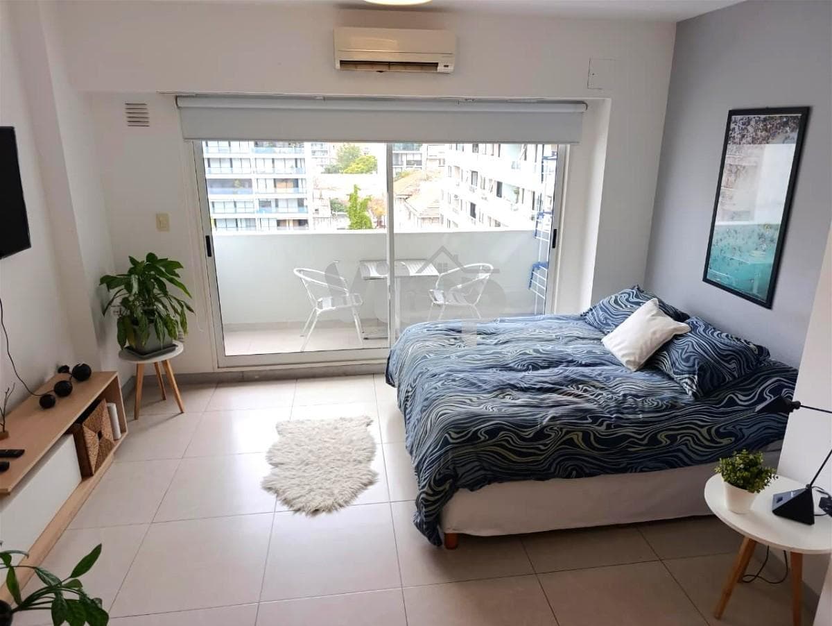 Studio apartment for short-term rent in Palermo Hollywood with a pool, grill, and laundry facilities