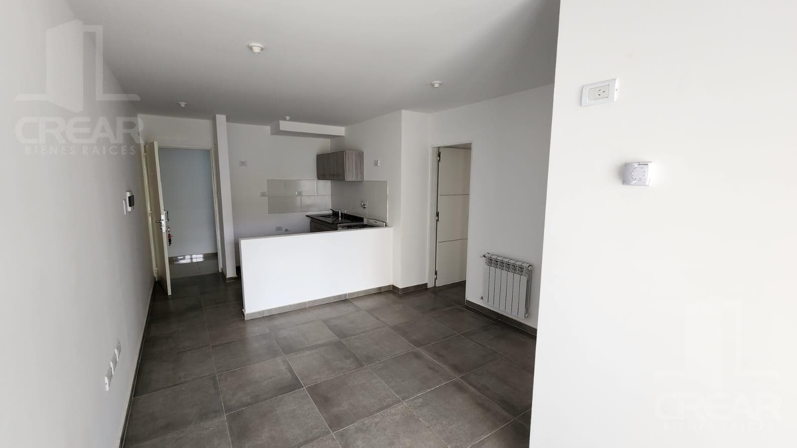 1-bedroom apartment with a balcony and a grill. Parking space included.