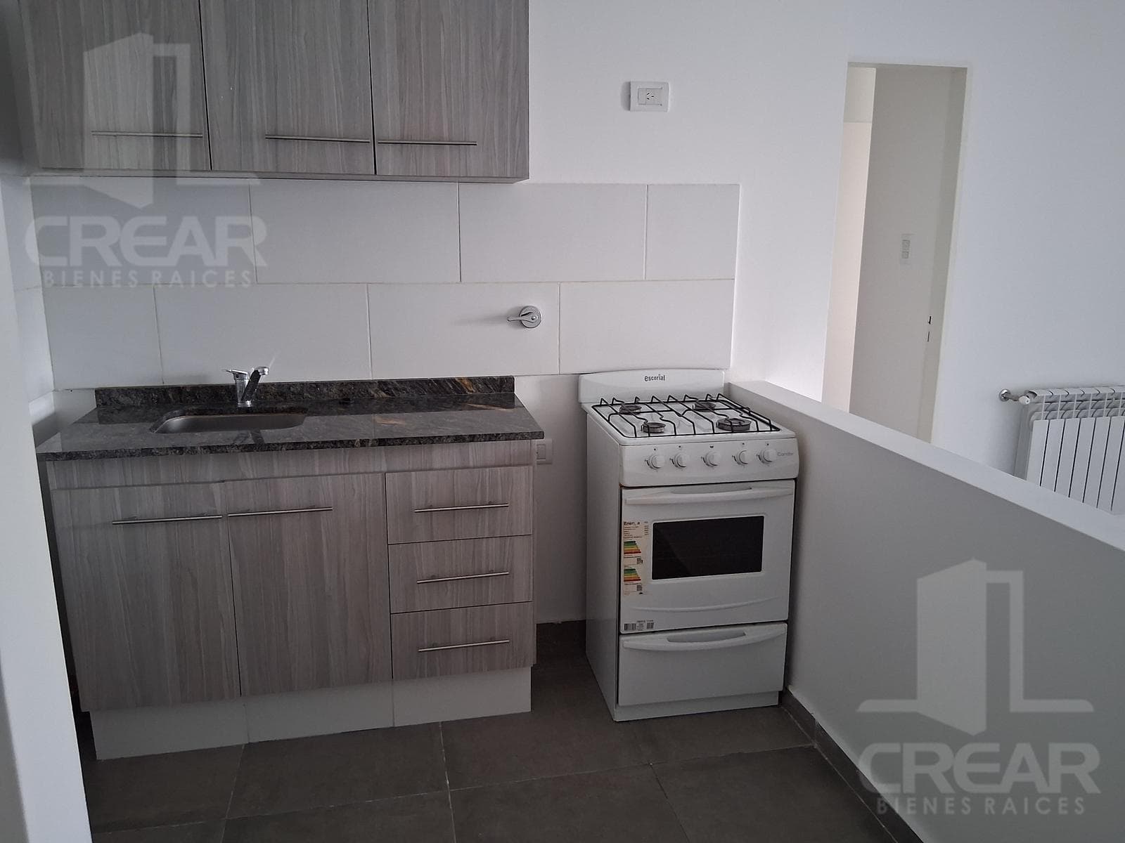 1-bedroom apartment with a balcony and a grill. Parking space included.