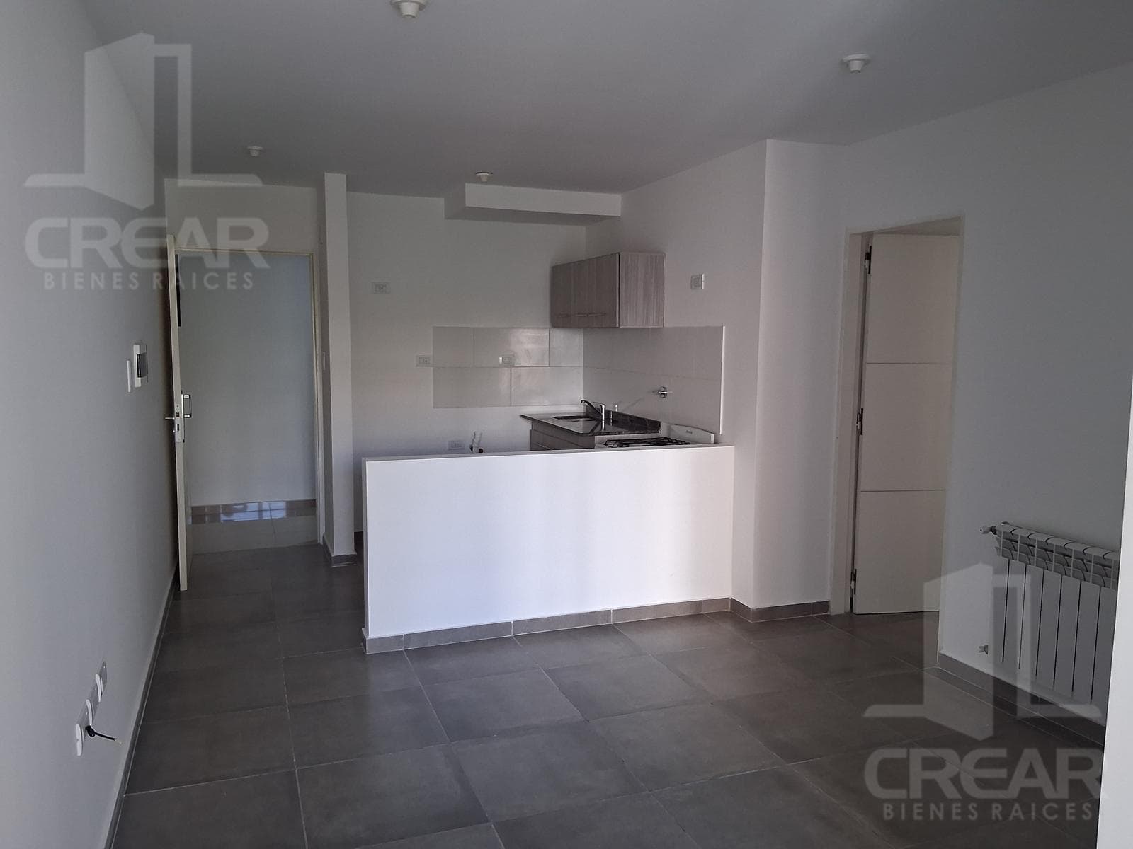 1-bedroom apartment with a balcony and a grill. Parking space included.