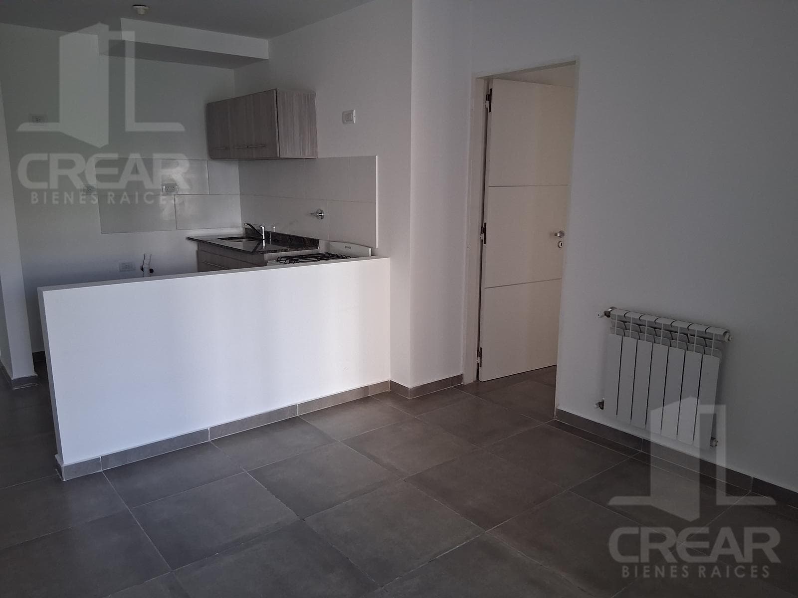 1-bedroom apartment with a balcony and a grill. Parking space included.