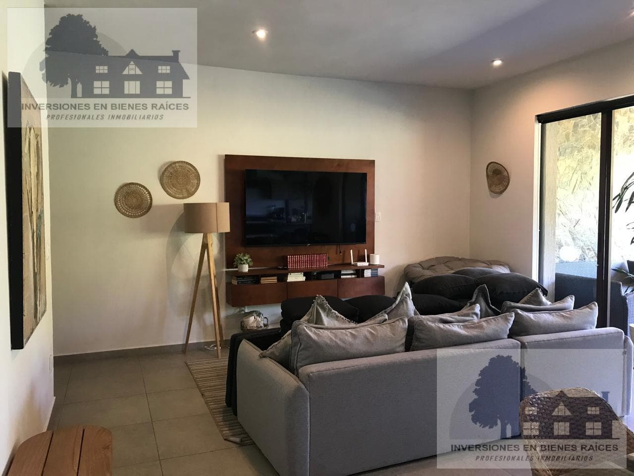 House for sale, located within a condominium complex