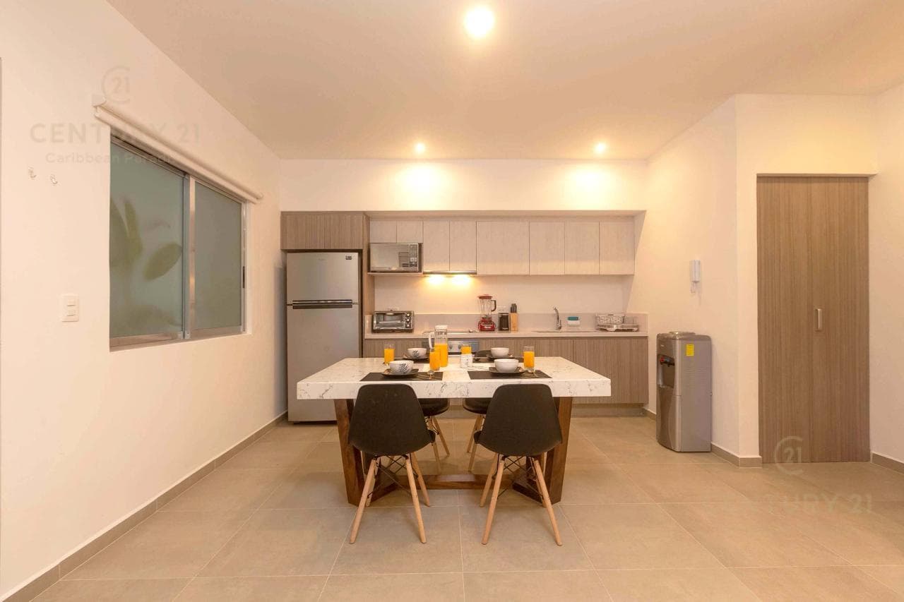 Inversión Perfecta: Hermoso Departamento Amueblado en el Corazón de Playa del Carmen P4366