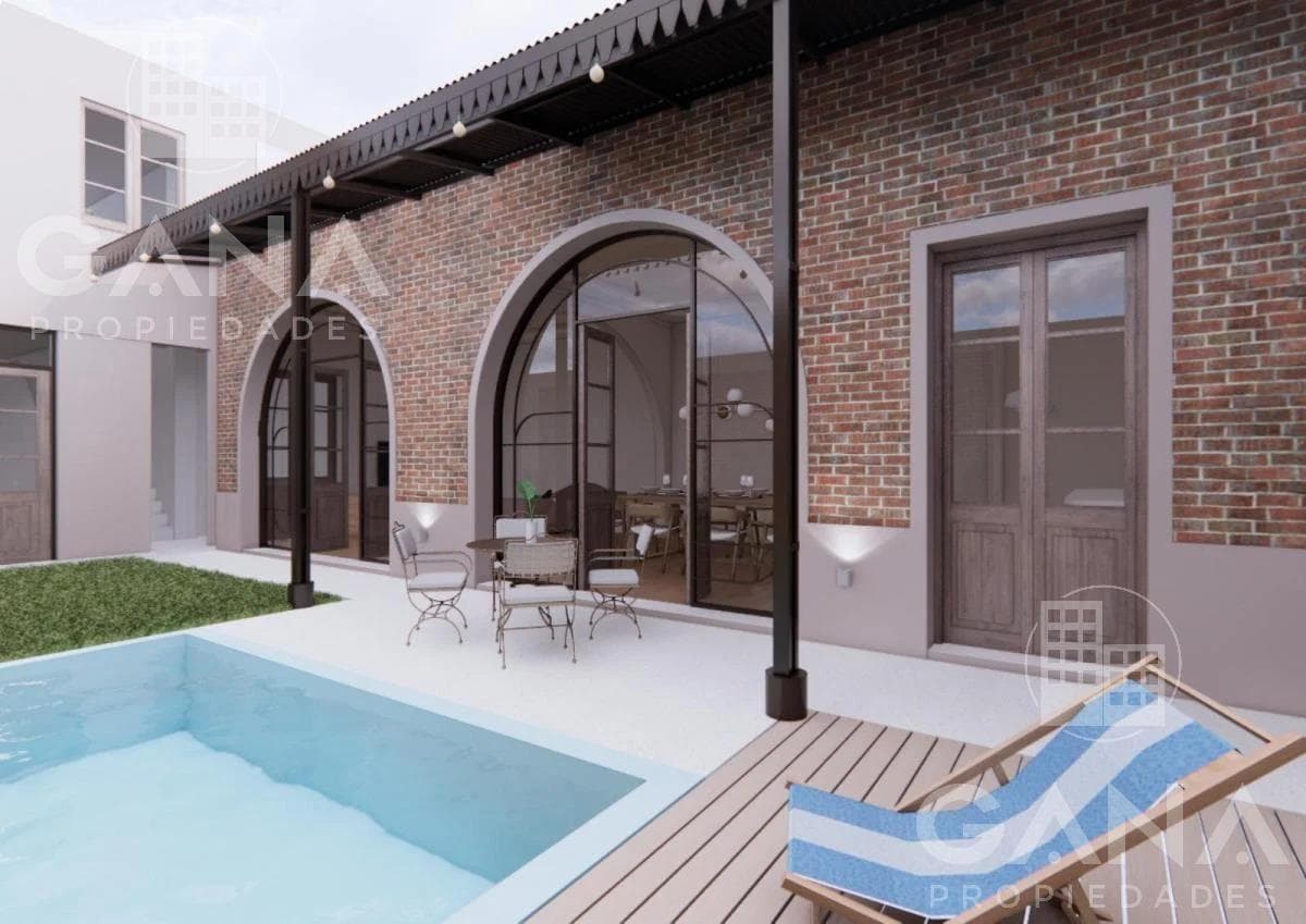 3-bedroom house for sale with a garden, pool, and garage, completely renovated.
