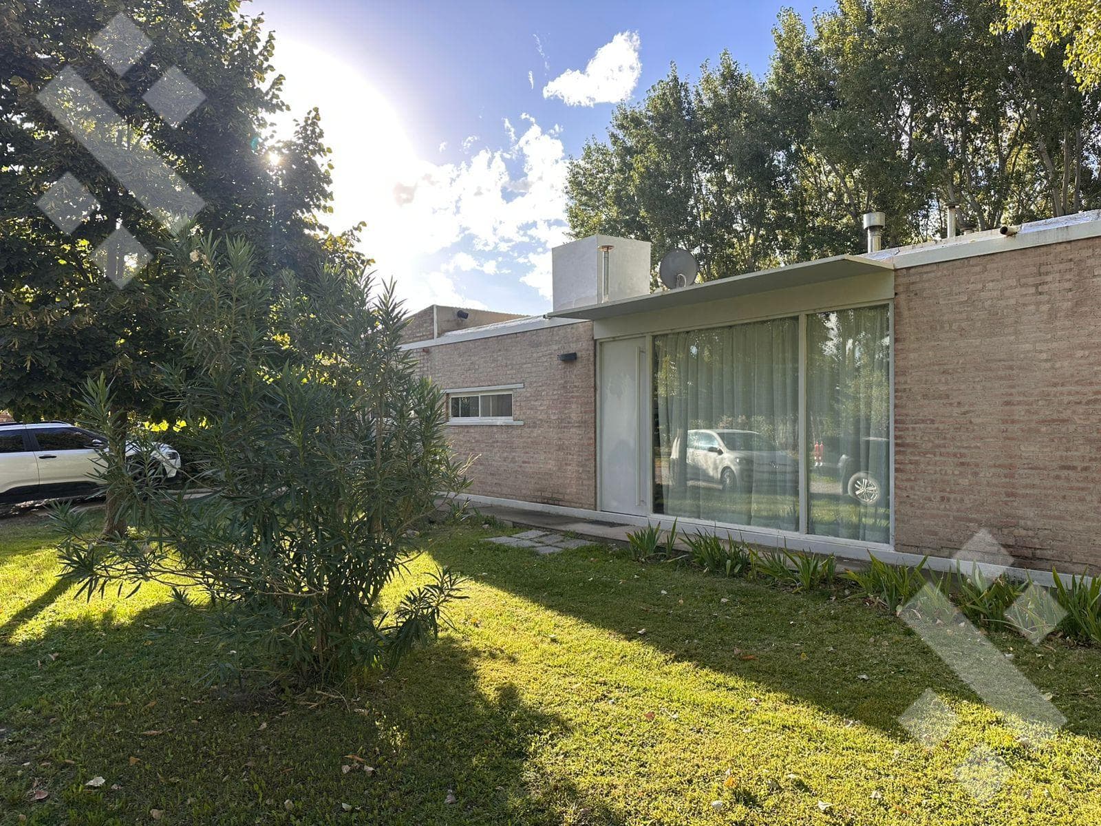 For Sale | 3-Bedroom House with a Porch | Fincas de Plottier Neighborhood