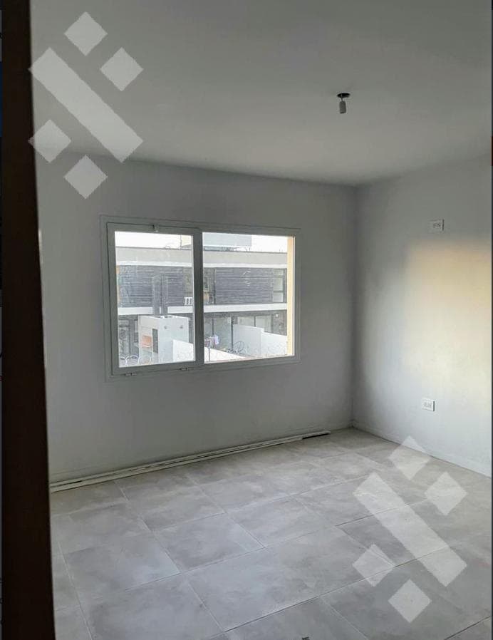 FOR SALE: 2-Bedroom Duplex with Rental Income in Altos Alberdi I, Plottier – A SMART INVESTMENT!