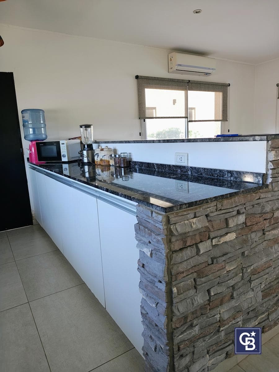 House for Sale: 3 Bedrooms and Separate Office with Pool in San Ramón, Pilar del Este