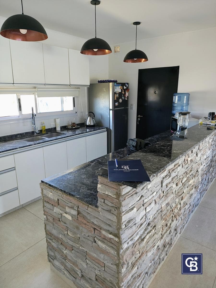House for Sale: 3 Bedrooms and Separate Office with Pool in San Ramón, Pilar del Este