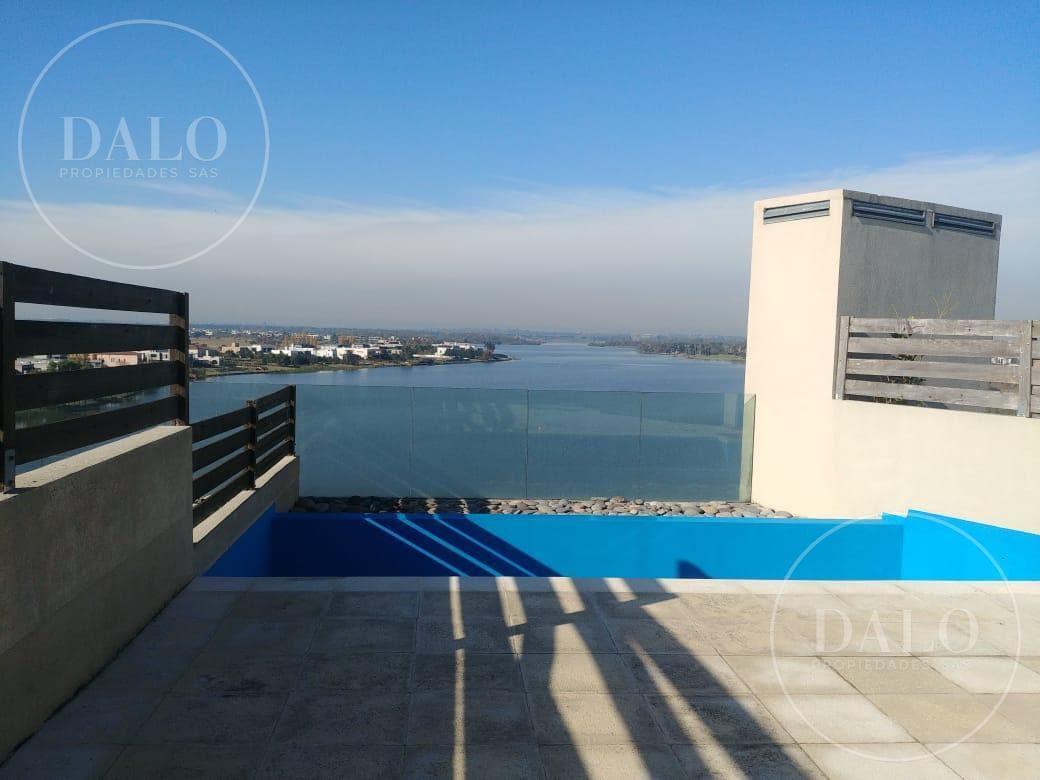 Incredible 3-Bedroom Apartment with a Terrace and Pool Overlooking the Central Lake in Praia, Nordelta