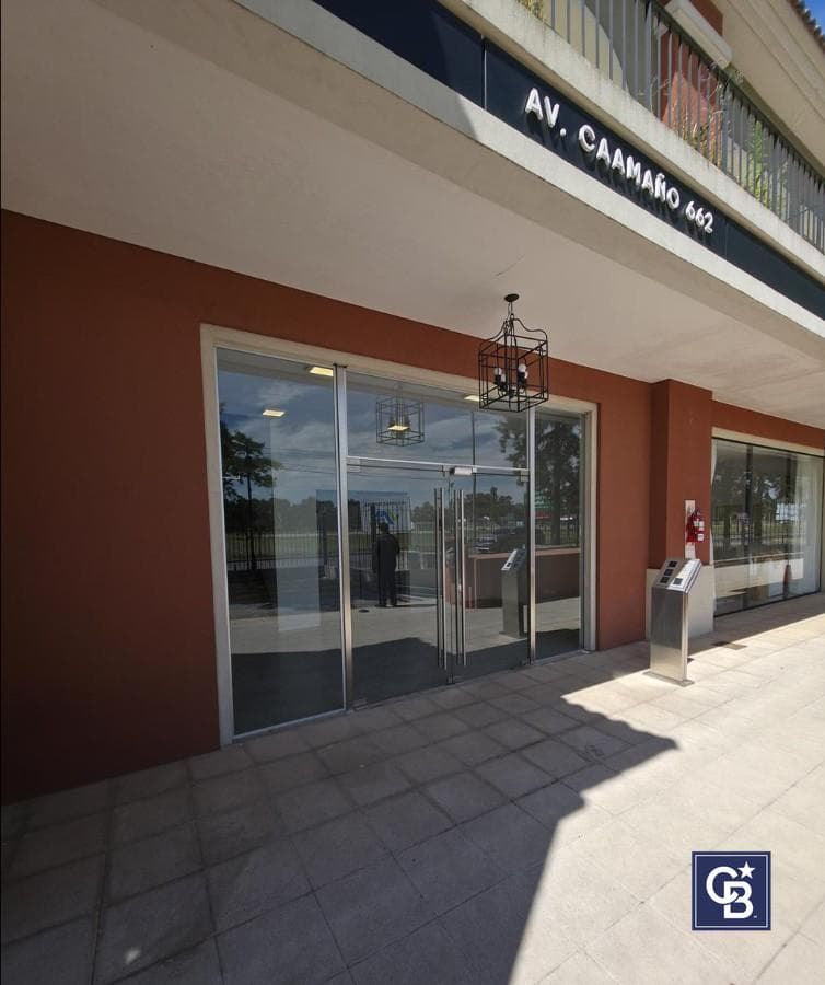Ideal Investment: Covered Parking Space for Sale at the Pueblo Caamaño Shopping Center, Pilar