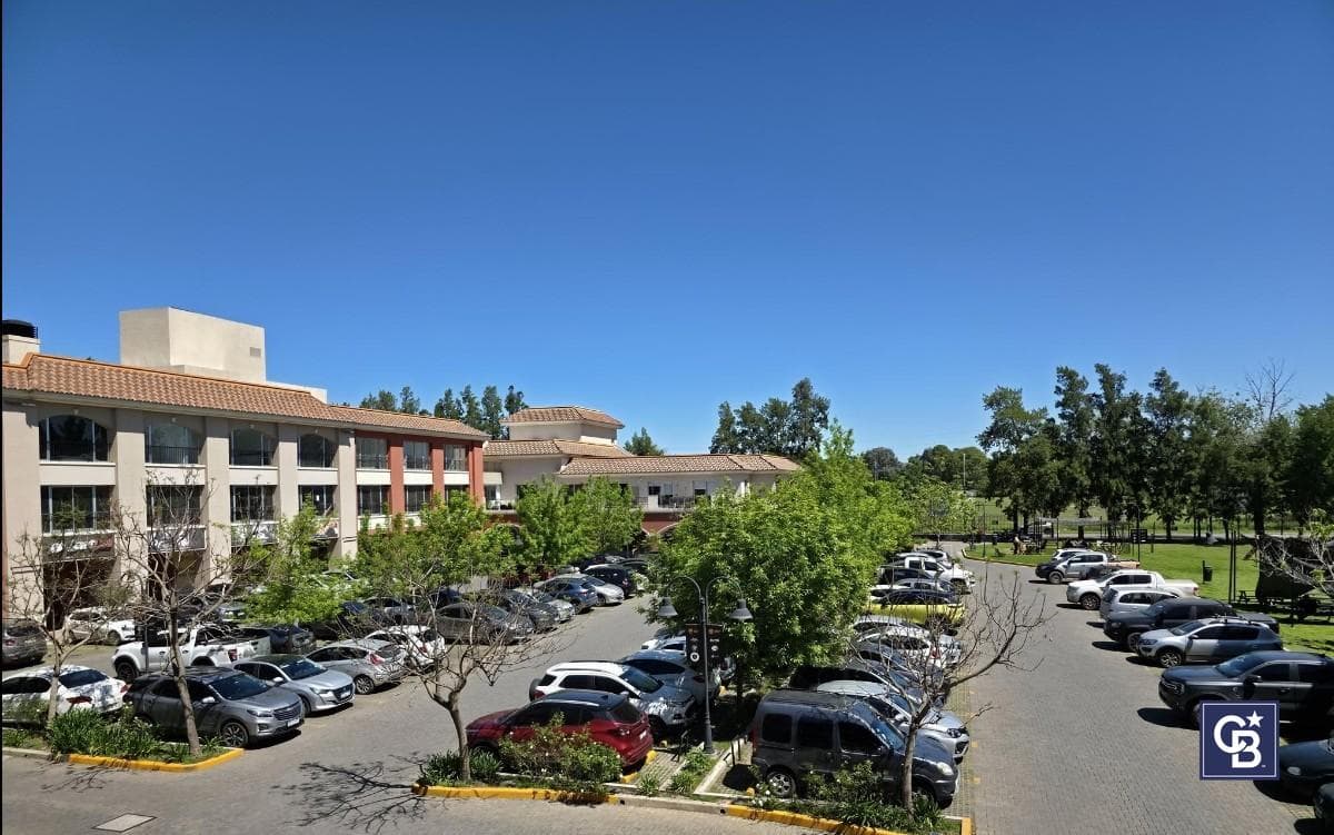 Ideal Investment: Covered Parking Space for Sale at the Pueblo Caamaño Shopping Center, Pilar
