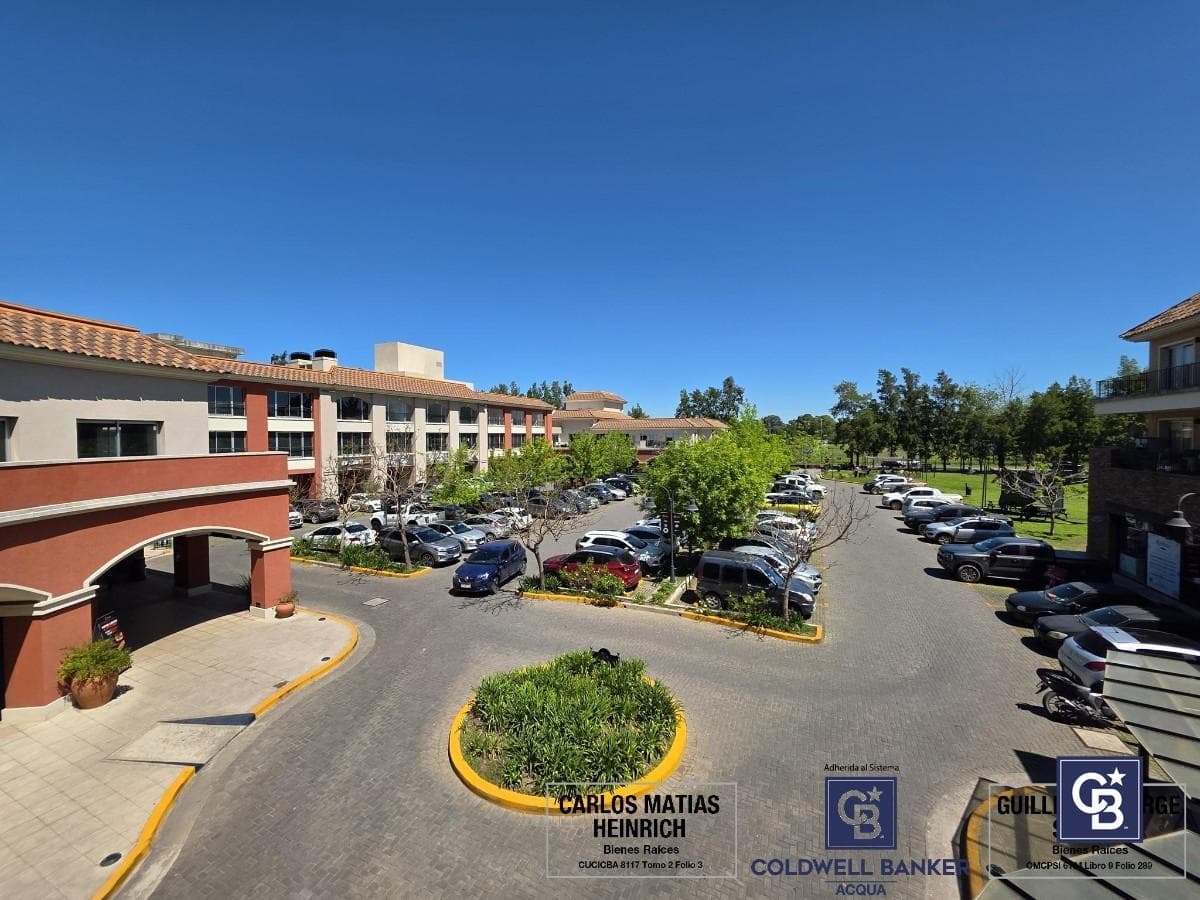 Ideal Investment: Covered Parking Space for Sale at the Pueblo Caamaño Shopping Center, Pilar