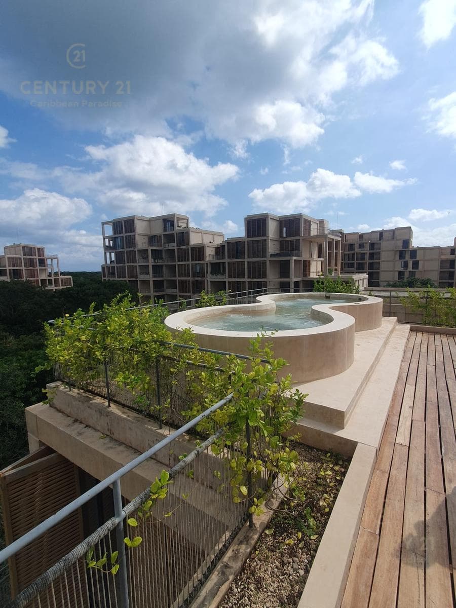 Apartment for Sale at The Village Corasol in Playa del Carmen with Private Beach Club C4106