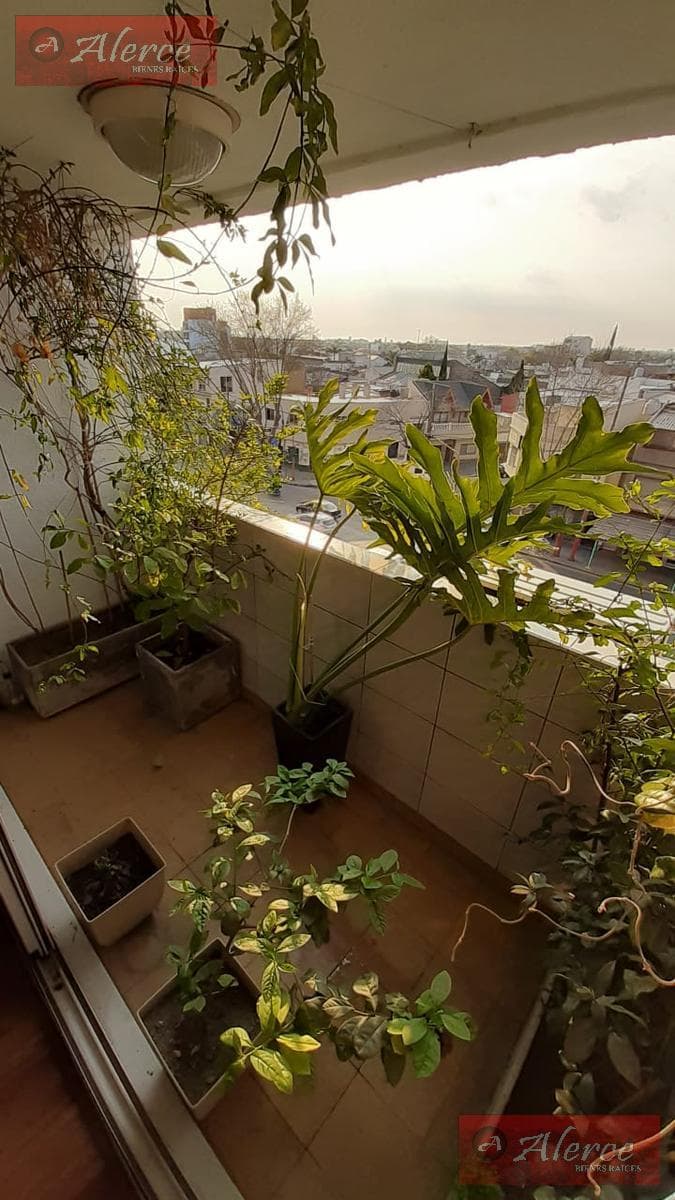 4-ROOM APARTMENT FACING THE STREET, WITH KITCHEN, DINING ROOM, LAUNDRY ROOM, AND BALCONY.