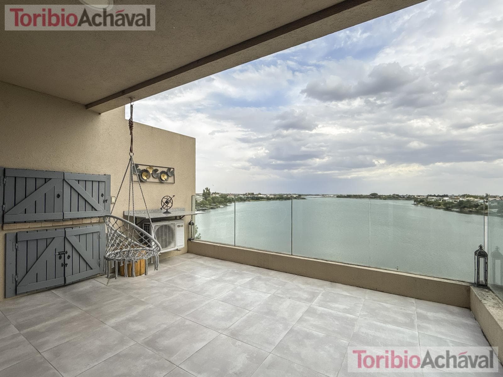 REPRICED. Praia 10, Portezuelo, Nordelta—For Sale with Rent, 3 bedrooms, overlooking Central Nordelta Lake, with garage