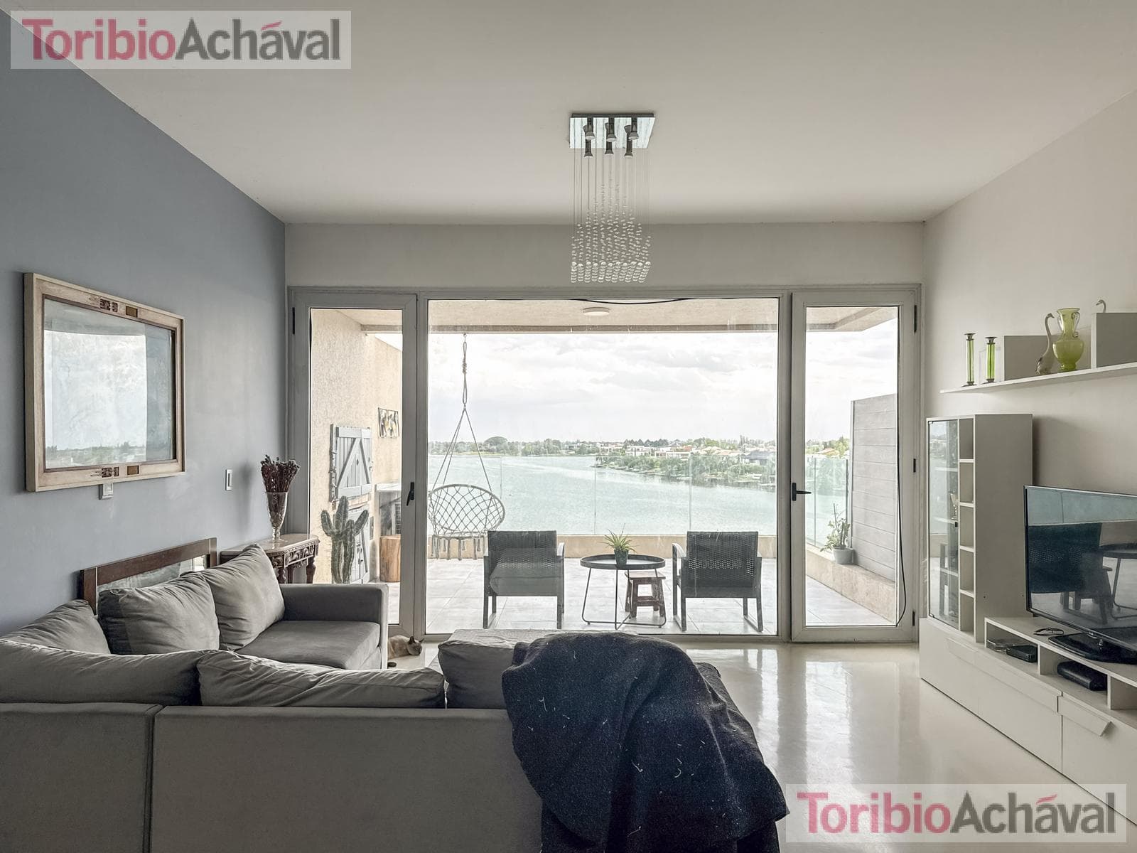 REPRICED. Praia 10, Portezuelo, Nordelta—For Sale with Rent, 3 bedrooms, overlooking Central Nordelta Lake, with garage
