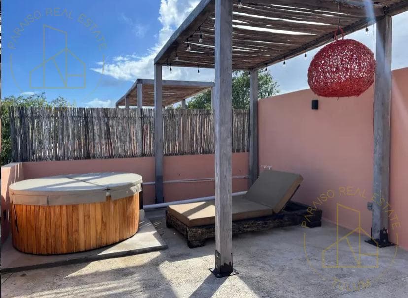 Cozy 2-bedroom apartment for rent on two levels, with a private hot tub on the rooftop, in Aldea Savia Tulum