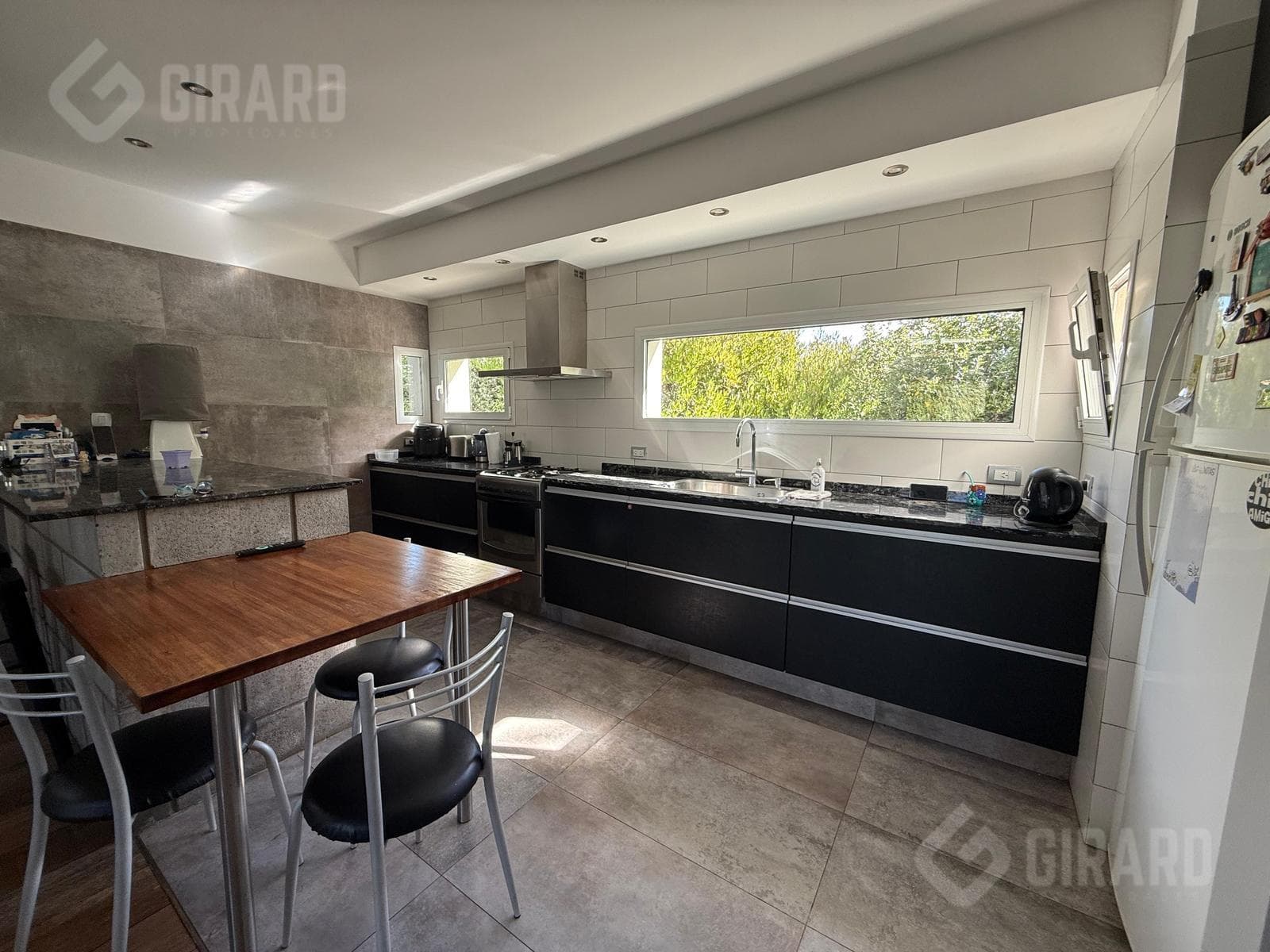 Modern 4-room home with a heated pool for sale in the Arenas del Sur gated community