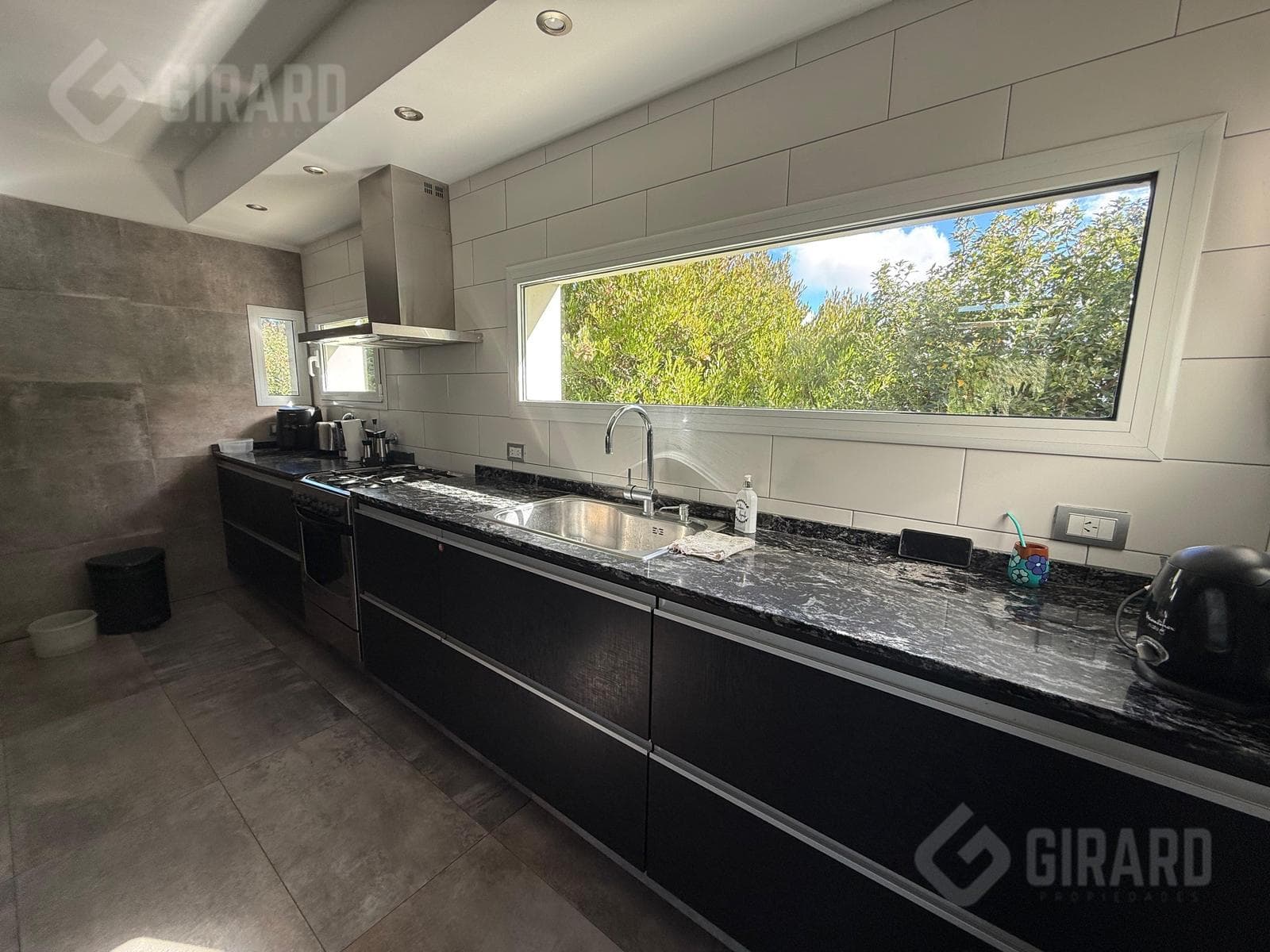 Modern 4-room home with a heated pool for sale in the Arenas del Sur gated community