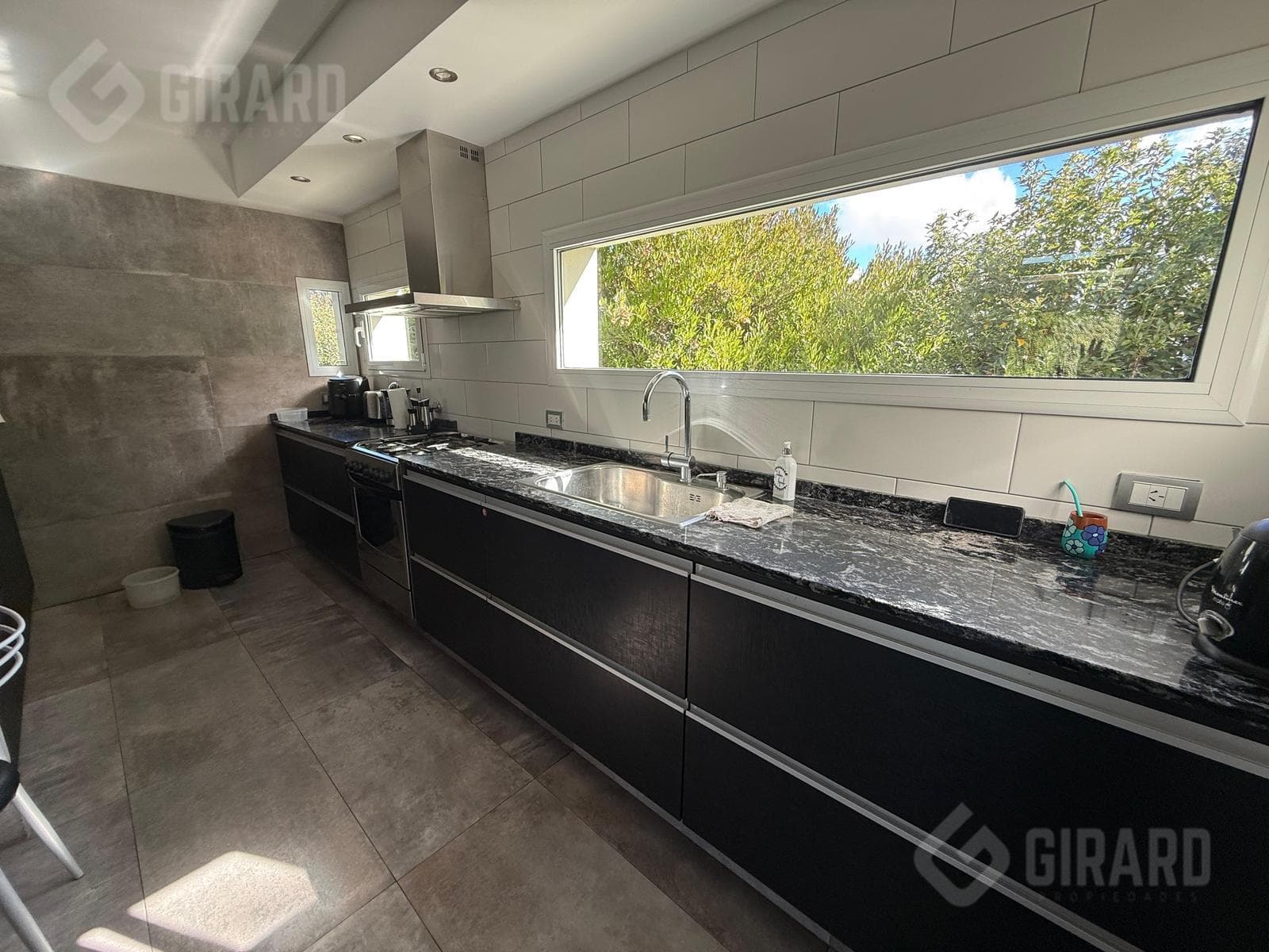 Modern 4-room home with a heated pool for sale in the Arenas del Sur gated community