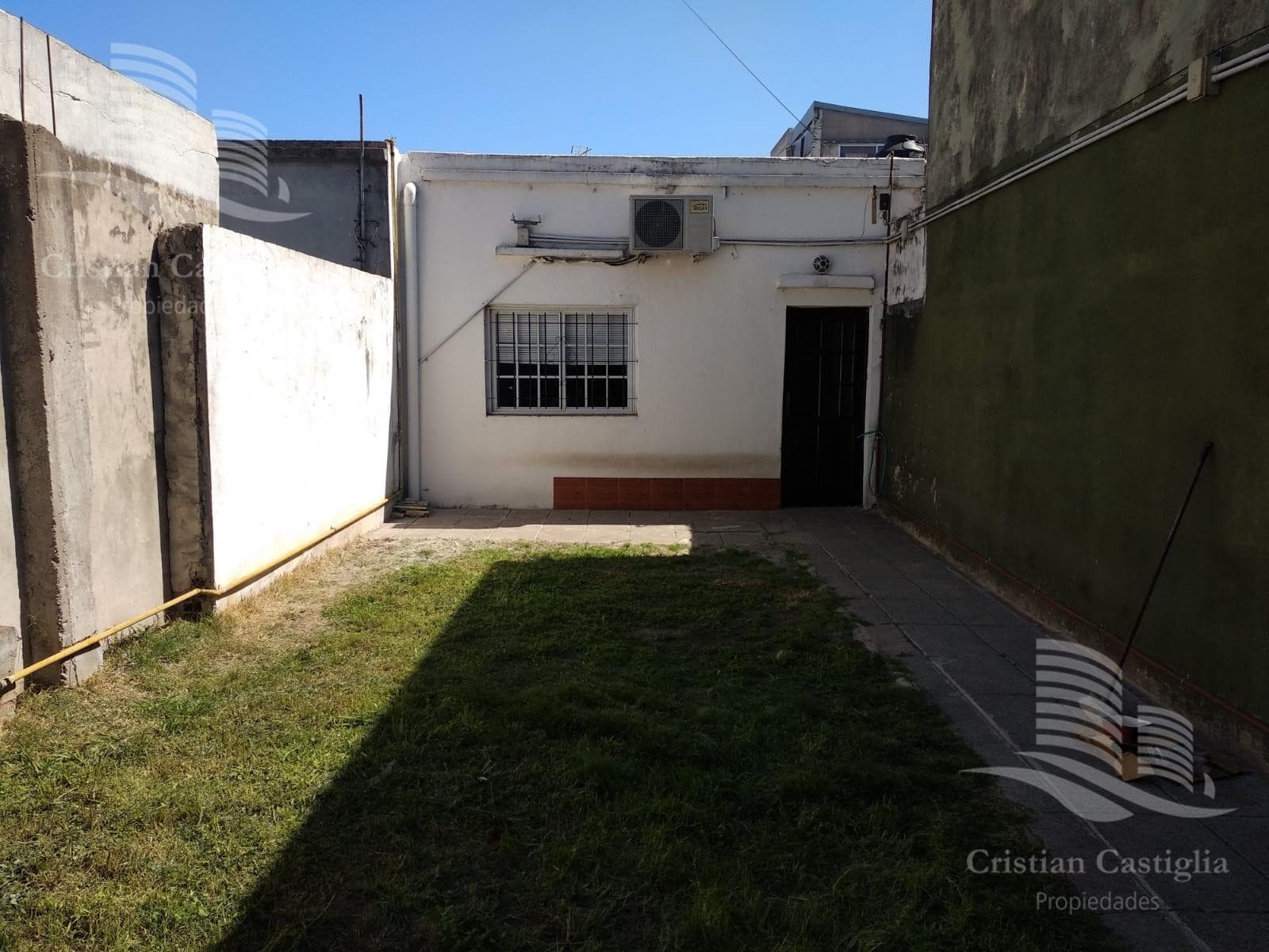 House on the corner with a garage