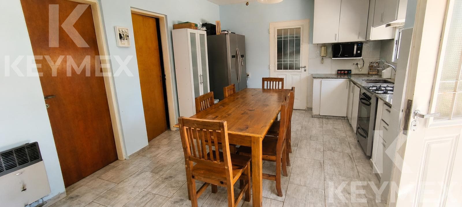 House for Sale in Los Hornos | 3 Bedrooms | Garage and Tree-Lined Yard