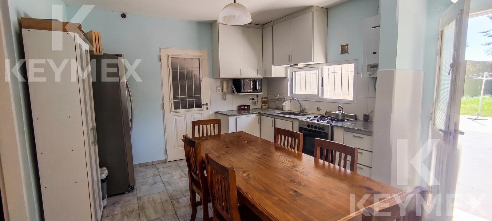House for Sale in Los Hornos | 3 Bedrooms | Garage and Tree-Lined Yard