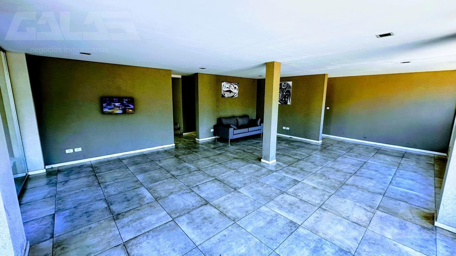 3 premium-style units on the ground floor with a garden, heated pool, and 2 covered parking spaces