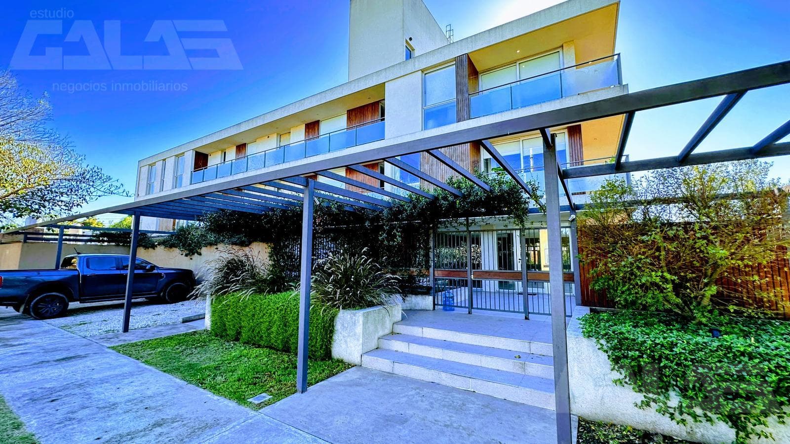 3 premium-style units on the ground floor with a garden, heated pool, and 2 covered parking spaces