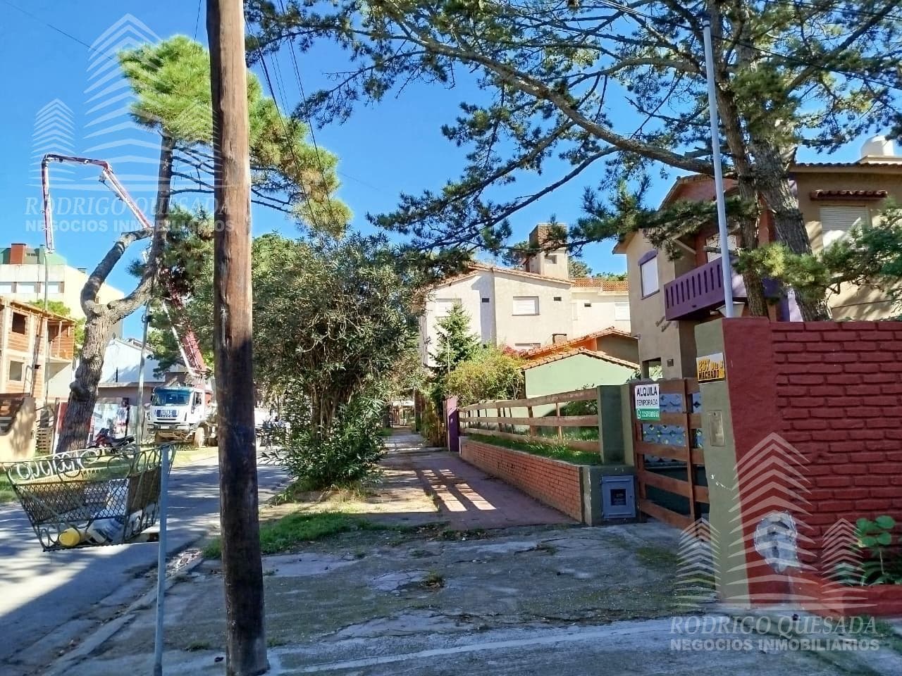 Studio apartment with 2 patios—barbecue area and laundry area.
