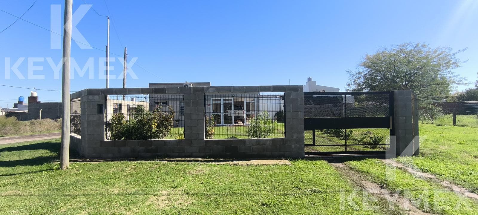 House for sale: 2 bedrooms, outdoor kitchen, grill, garden, garage | El Retiro Neighborhood – La Plata