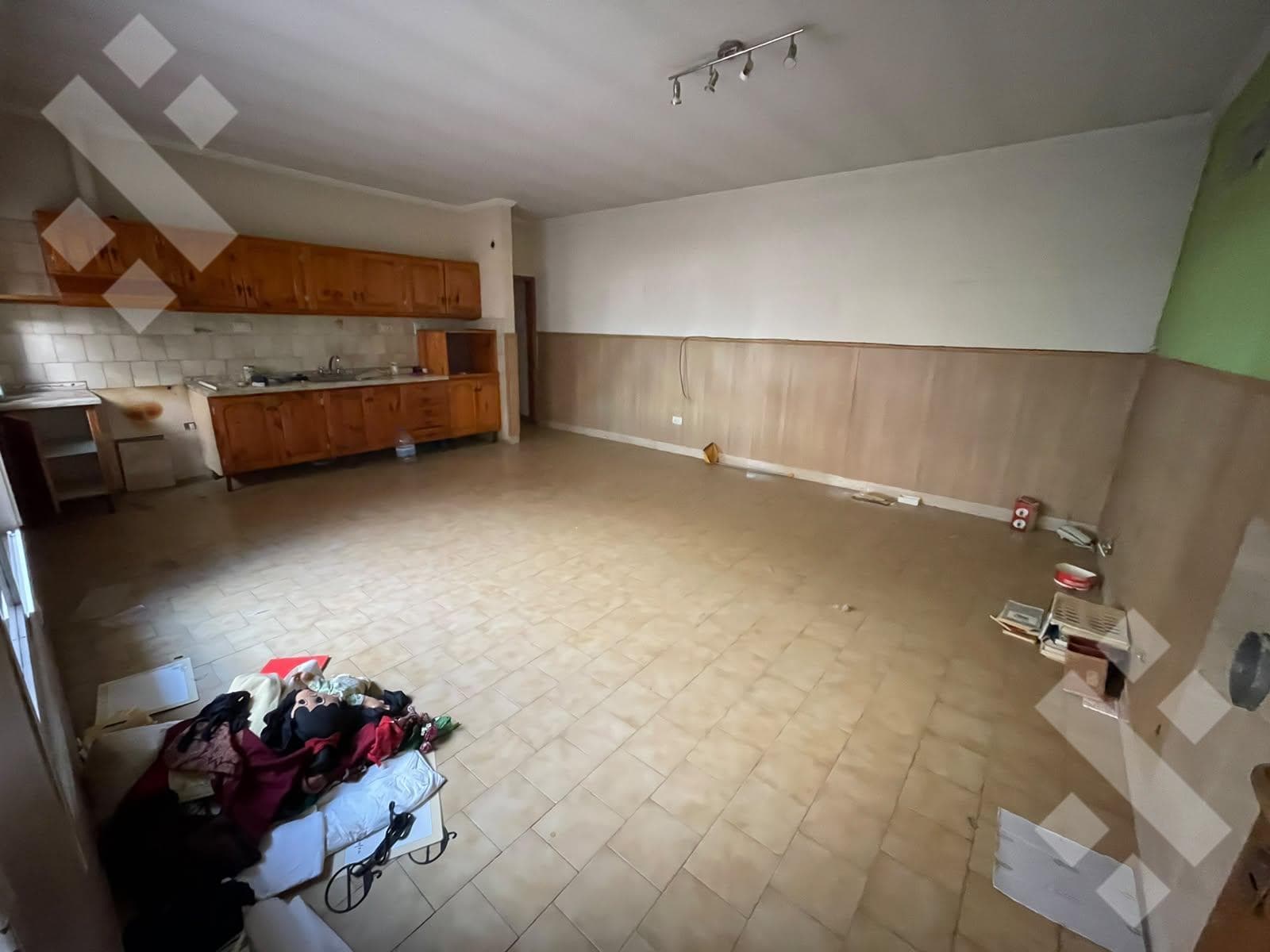LAND FOR SALE WITH TWO 2-BEDROOM HOMES, A GARAGE, AND A BARBECUE AREA - BELGRANO NEIGHBORHOOD - NEUQUÉN CITY