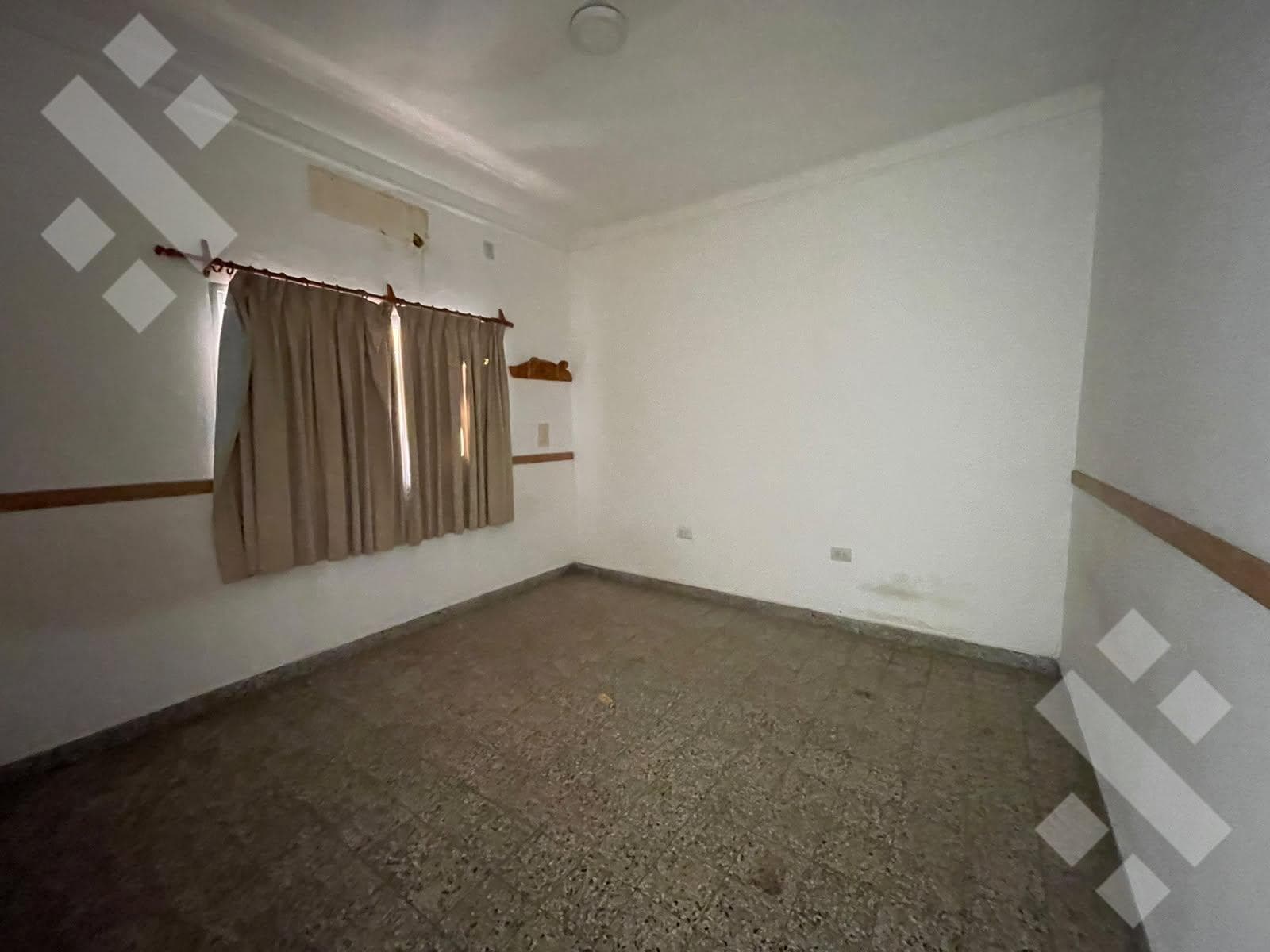 LAND FOR SALE WITH TWO 2-BEDROOM HOMES, A GARAGE, AND A BARBECUE AREA - BELGRANO NEIGHBORHOOD - NEUQUÉN CITY