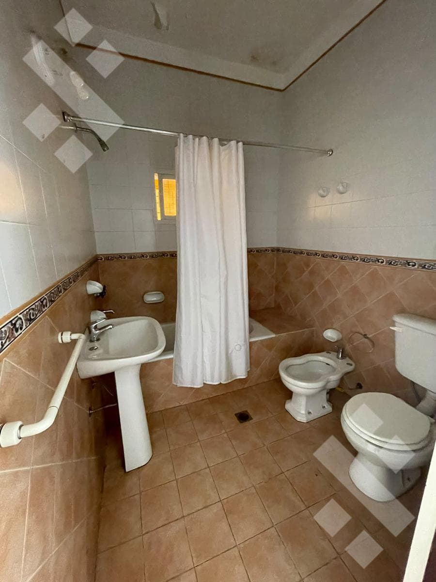 LAND FOR SALE WITH TWO 2-BEDROOM HOMES, A GARAGE, AND A BARBECUE AREA - BELGRANO NEIGHBORHOOD - NEUQUÉN CITY