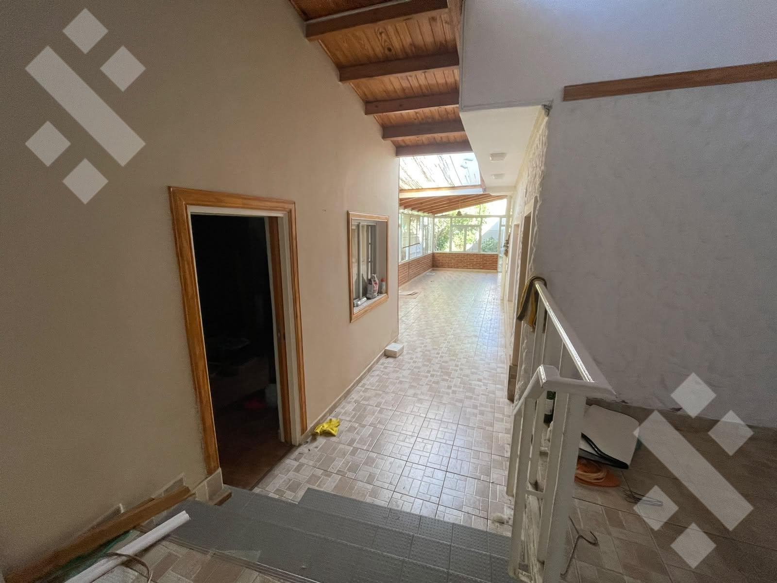LAND FOR SALE WITH TWO 2-BEDROOM HOMES, A GARAGE, AND A BARBECUE AREA - BELGRANO NEIGHBORHOOD - NEUQUÉN CITY