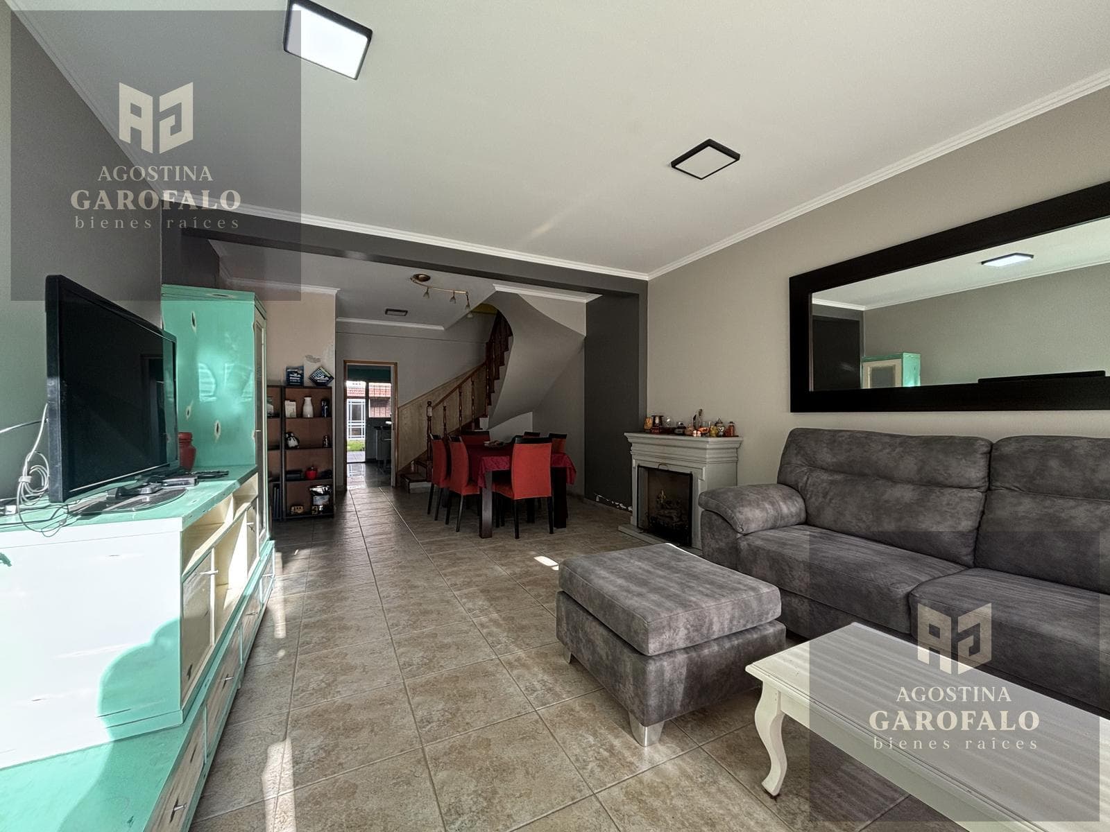 4-room duplex with a garage, backyard, and barbecue area