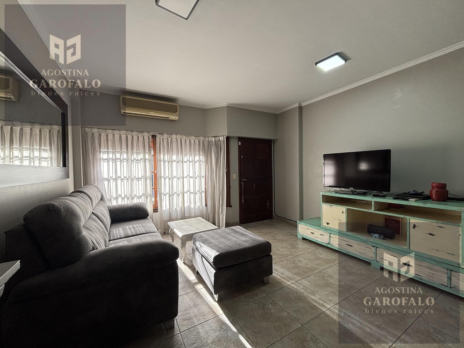 4-room duplex with a garage, backyard, and barbecue area