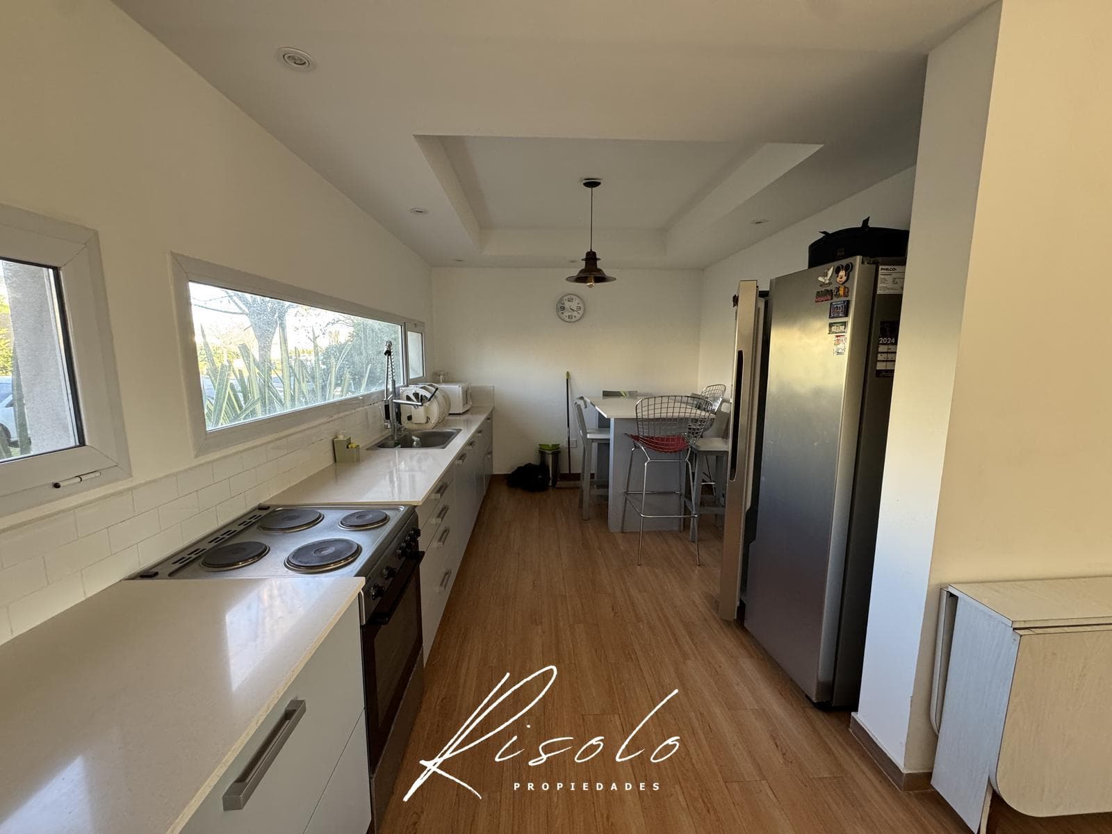 House for sale with a lot overlooking the lagoon and a pool on the island. Gated community, Escobar