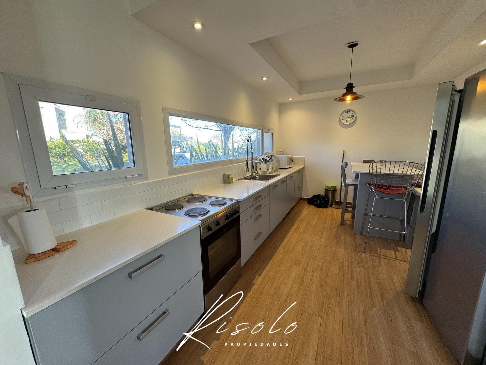 House for sale with a lot overlooking the lagoon and a pool on the island. Gated community, Escobar