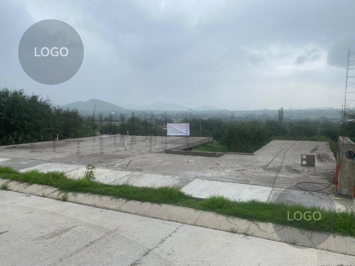Land with a building for sale